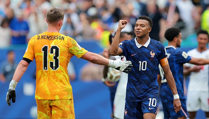 Frances Kylian Mbappe with Englands goalkeeper Dean Henderson after the Fifa World Cup third-place playoff at Miami Stadium, Miami Gardens, United States, on July 18, 2026. — Reuters