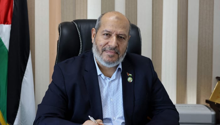 Khalil al-Hayya, senior Hamas leader, smiles during an interview with AFP at his office in Gaza City on April 21, 2021. — AFP