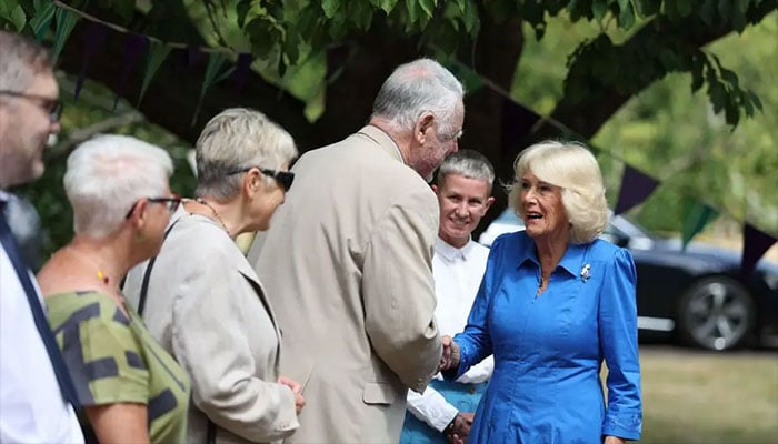 Queen Camilla shares emotional moment with Sir Terry Waite, as King visits Cambridge