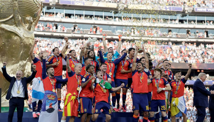 Spanish king hails World Cup heroes as celebration tour begins 14 US President Donald Trump and Fifa President Gianni Infantino applaud after presenting the World Cup trophy to Spain after its victory in the 2026 World Cup final at New York New Jersey Stadium in East Rutherford, New Jersey, US, July 19, 2026. — Reuters