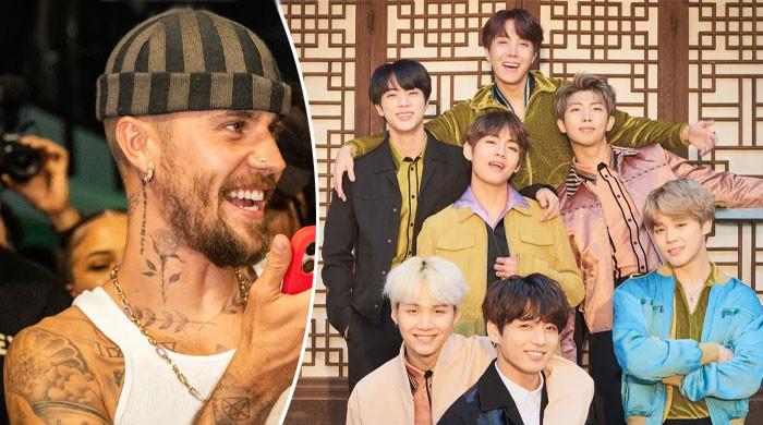 Justin Bieber hugs one BTS member after halftime performance