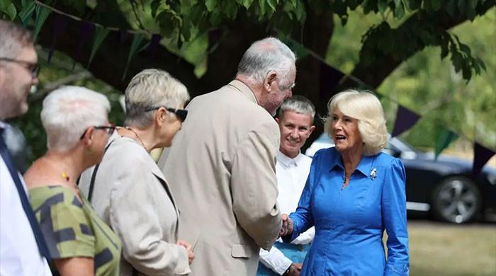 Queen Camilla shares emotional moment with Sir Terry Waite, as King visits Cambridge