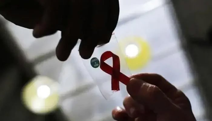 Red ribbon highlights awareness, prevention and support for those affected by HIV. — Reuters/File