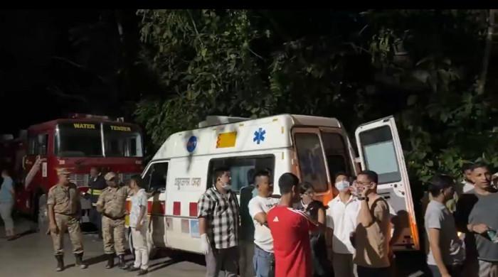 Nine dead, 15 trapped after India tunnel collapse