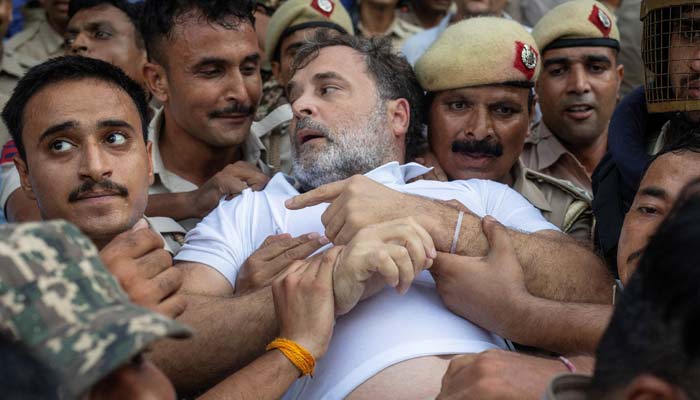 Indian opposition leader Rahul Gandhi is detained by police during a sit-in protest outside Prime Minister Narendra Modis residence, demanding accountability for police action against students, in New Delhi, India, July 21, 2026. — Reuters