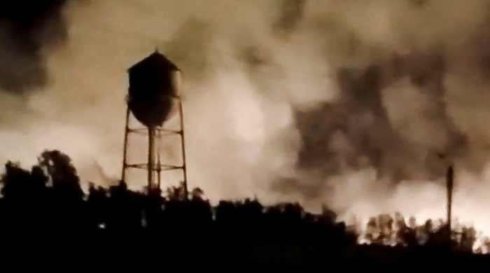 US strikes on Iran continue for 11th night as Tehran warns of wider reprisals