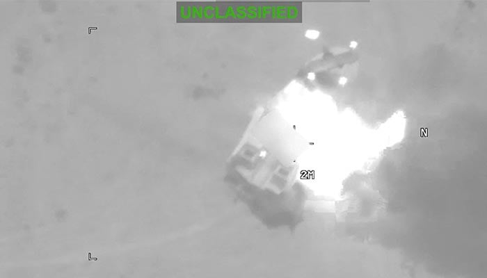 A boat is ablaze, at an unknown location, during what the U.S. Central Command says are strikes on Iran, in this screengrab taken from a handout video released on July 22, 2026. — Reuters