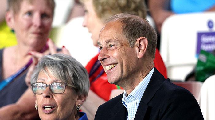 Prince Edward arrives before the King to enjoy 'Drums and Roses' performance