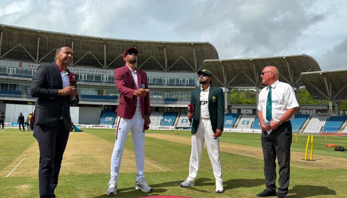 Pakistan captain Babar Azam (second from right) and West Indies Roston Chase (second from left) at the toss for their first Test at the Brian Lara Cricket Academy in Tarouba, July 25, 2026. — X/@TheRealPCB
