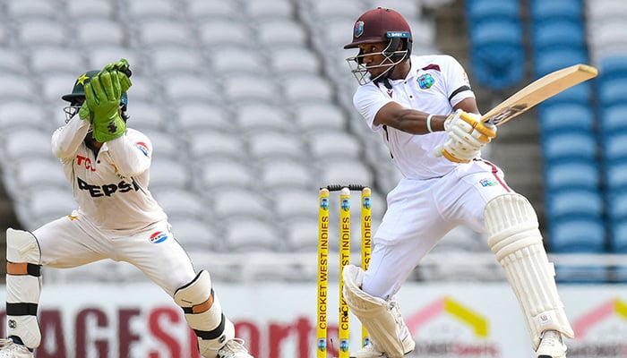 Kavem Hodge of West Indies hits 4 during the first day of the first Test cricket match between West Indies and Pakistan at the Brian Lara Cricket Academy in Tarouba, Trinidad and Tobago, on July 25, 2026. — AFP