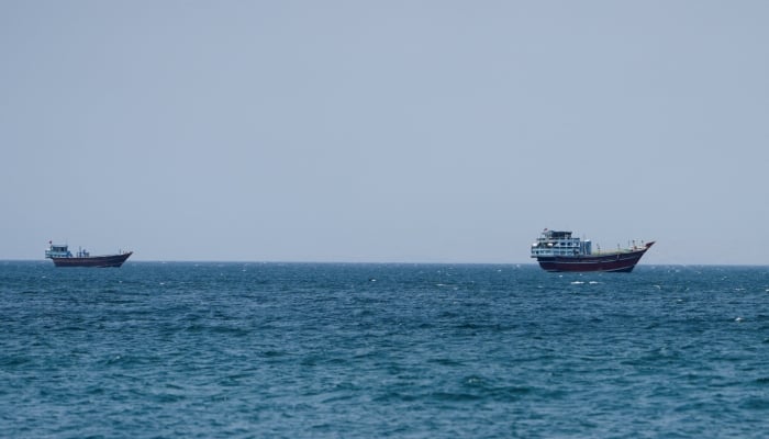 Vessels at the Strait of Hormuz, as seen from Musandam, Oman, July 26, 2026. — Reuters