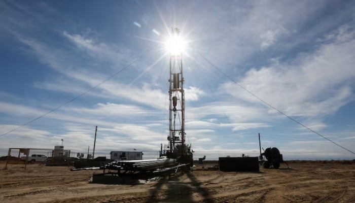 Sunlight shines through a drilling rig at the Airankol oil field operated by Caspiy Neft in the Atyrau region, Kazakhstan, April 21, 2026. — Reuters