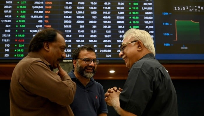 Stockbrokers interact during a trading session at the Pakistan Stock Exchange (PSX) in Karachi on May 12, 2025. — AFP