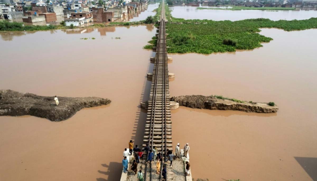 Floodwaters submerge large parts of a residential area following intense monsoon rainfall. — AFP