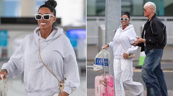 Katie Price wears wedding ring despite divorce consultation
