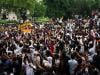 India activists demand release of detained 'cockroach' protesters