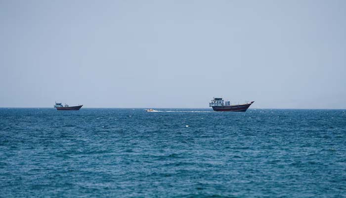 Vessels at the Strait of Hormuz, as seen from Musandam, Oman, July 26, 2026. — Reuters