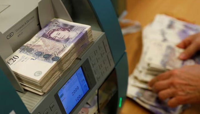 This representational image shows British Pound Sterling banknotes in a counter machine at the Money Service Austria companys headquarters in Vienna, Austria, November 16, 2017. — Reuters