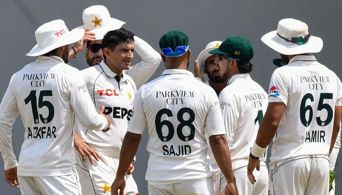 Pakistans Mohammad Abbas (third from left) celebrates taking a wicket with teammates during the third day of their first Test against West Indies at the Brian Lara Cricket Academy in Tarouba on July 27, 2026. — AFP