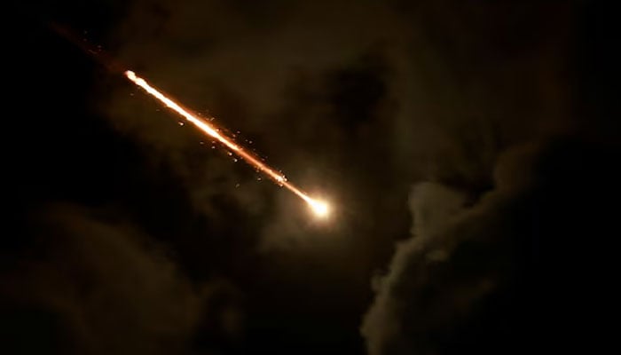 This representational image shows a projectile is seen in the sky after Iran fired a salvo of ballistic missiles, as seen from Tel Aviv, Israel, October 1. — Reuters