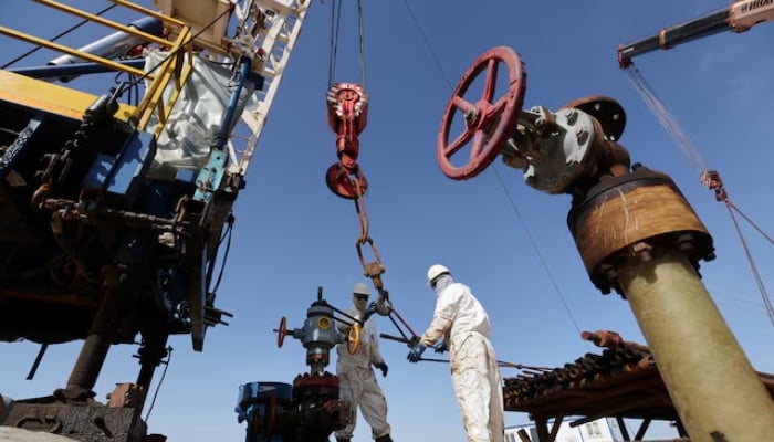 Specialists work at a drilling rig at the Airankol oil field operated by Caspiy Neft in the Atyrau region, Kazakhstan, April 20, 2026. — Reuters