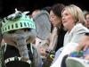 Hillary Clinton cheers on Ellie the Elephant during Liberty game halftime show