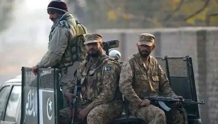 Pakistan Army personnel conduct patrol duties aboard a military vehicle in this undated photo. — AFP/File