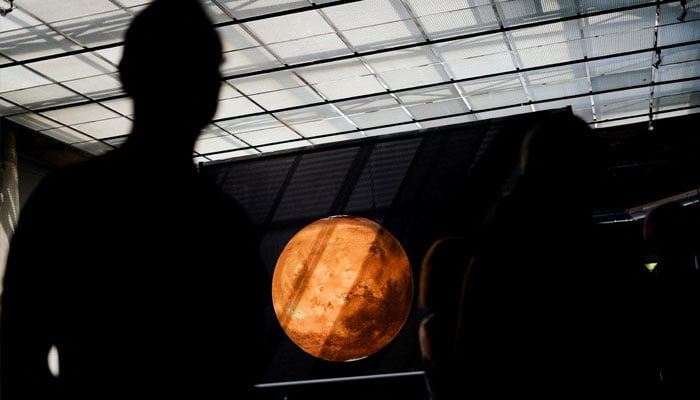 People watch an exhibition in Madrid’s Planetarium as the city counts down to the solar eclipse on August 12, in Madrid, Spain, August 9, 2026. — Reuters