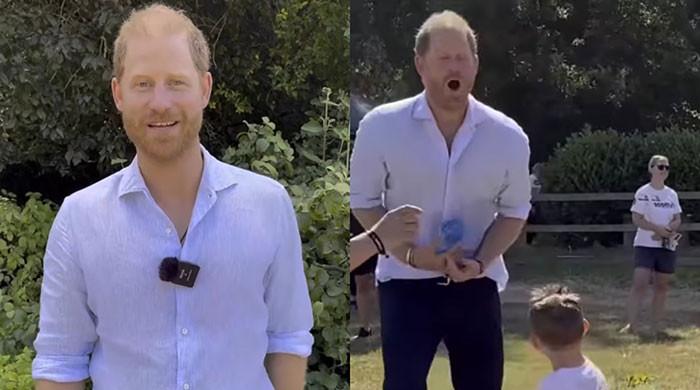 Prince Harry can't stop laughing after being 'pelted three times' in stomach