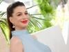 Anne Hathaway claps back at trolls questioning 'fake' baby bump