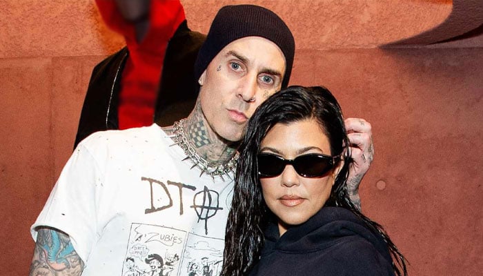 Kourtney Kardashian cheers on Travis Barker at ‘Louder Than Fear’ premiere