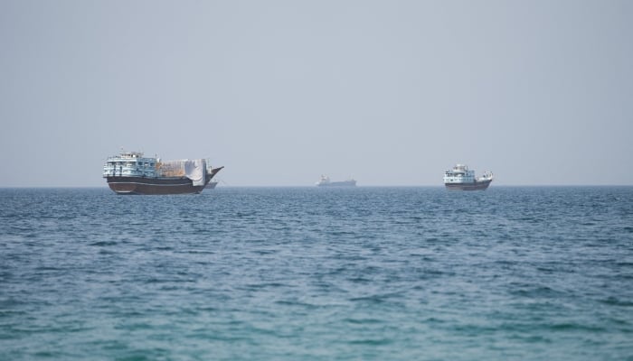 Vessels near the Strait of Hormuz, as seen from Musandam, Oman, August 6, 2026. — Reuters