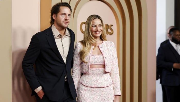 Margot Robbie enjoys date night with Tom Ackerley in Paris
