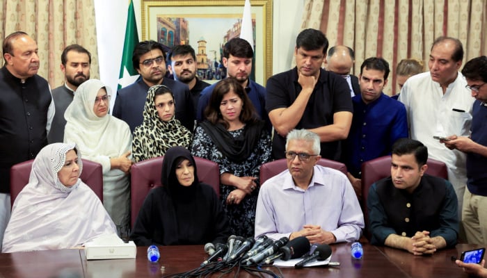 Uzma Khan (centre left), sister of the jailed former prime minister Imran Khan, during a press conference in Islamabad, on August 21, 2026. — Reuters