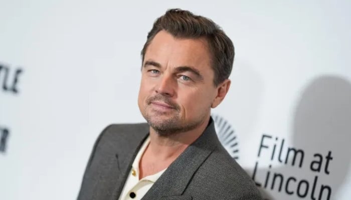 Leonardo DiCaprio covers face during latest sighting