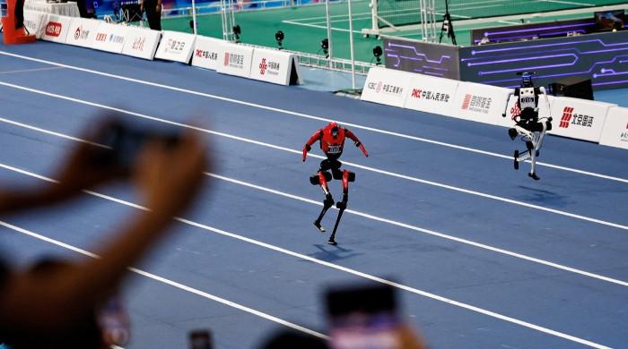 Robots can outrun humans, but can they plug in a cable?
