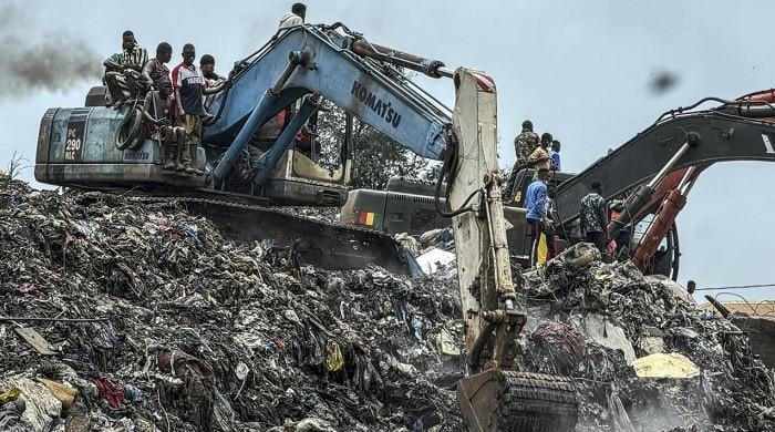 30 killed as landfill collapses onto homes in Guinea capital following heavy rains