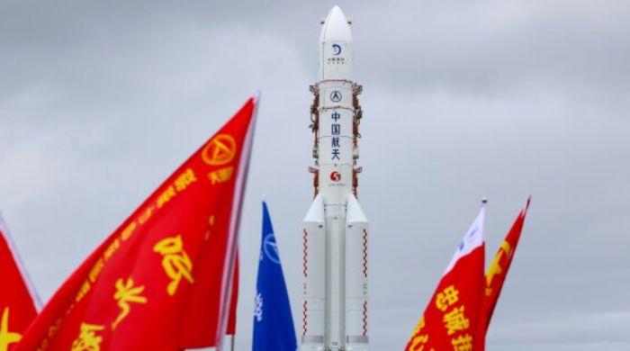 Why did China postpone historic Chang'e-7 lunar mission launch?