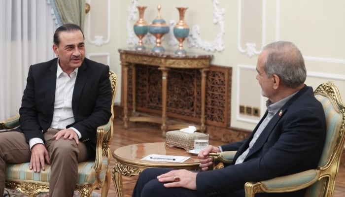 Chief of Defence Forces (CDF) and Chief of Army Staff (COAS) Field Marshal Syed Asim Munir (left) speaks during a meeting with Irans President Masoud Pezeshkian in Tehran, Iran, August 25, 2026. — X/@drpezeshkian2