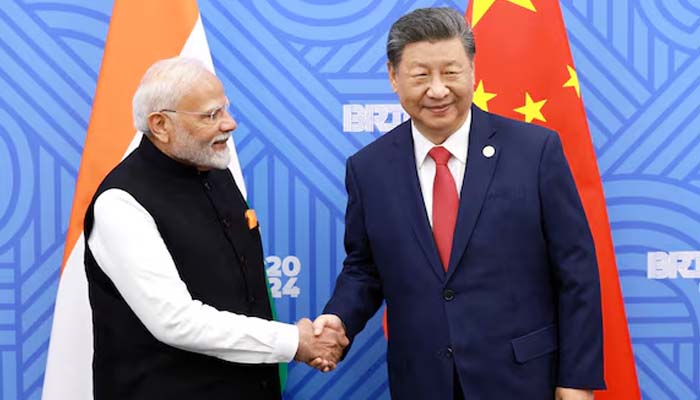 Chinese President Xi Jinping and Indian Prime Minister Narendra Modi meet on the sidelines of the Brics summit in Kazan, Russia, on October 23, 2024. — Reuters