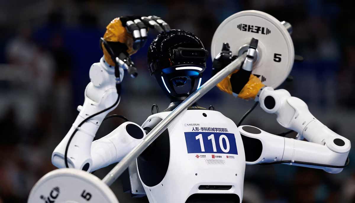 A Tiangong humanoid robot takes part in a weightlifting contest during the 2026 World Humanoid Robot Games at the National Speed Skating Oval in Beijing, China, on August 24.— Reuters