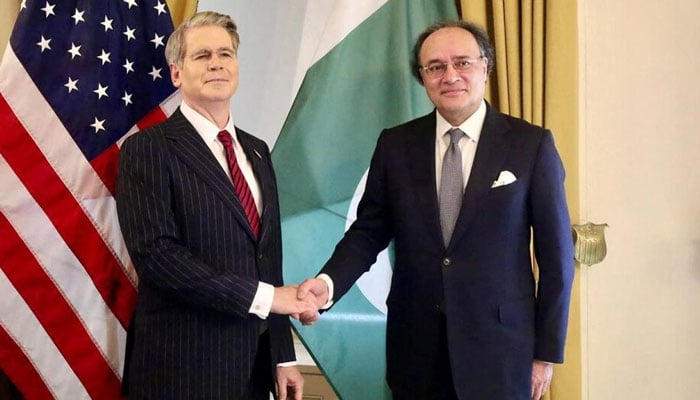 Finance Minister Muhammad Aurangzeb (right) and US Treasury Secretary Scott Bessent shake hands as they meet in Washington, DC, US, July 21, 2026. — Reuters