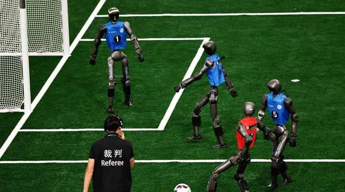 Faster, stronger, (occasionally) upright: Humanoid robots compete in Beijing games