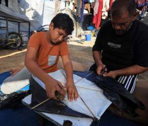 Gaza parents urged to stop kids flying kites after Israel warning to Hamas