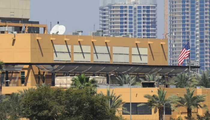 The US flag flying at the American embassy in Baghdad, Iraq, on March 17, 2026. — Reuters