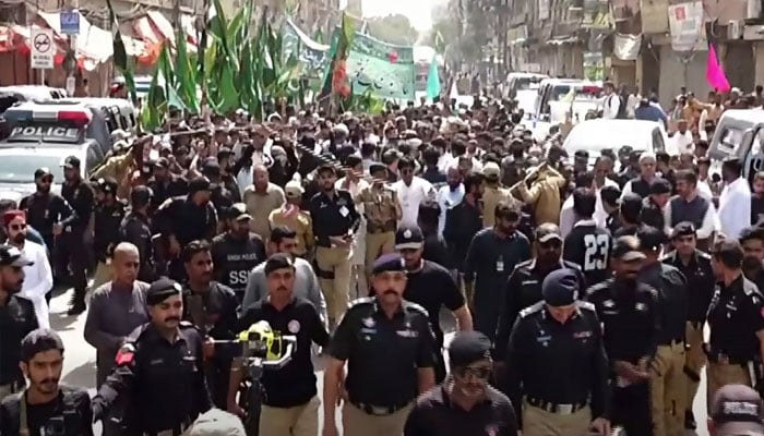 Participants in an Eid Milad-un-Nabi (PBUH) procession pass along a road near Memon Masjid in Karachi on August 26, 2026. — Facebook/Sindh Chief Minister House