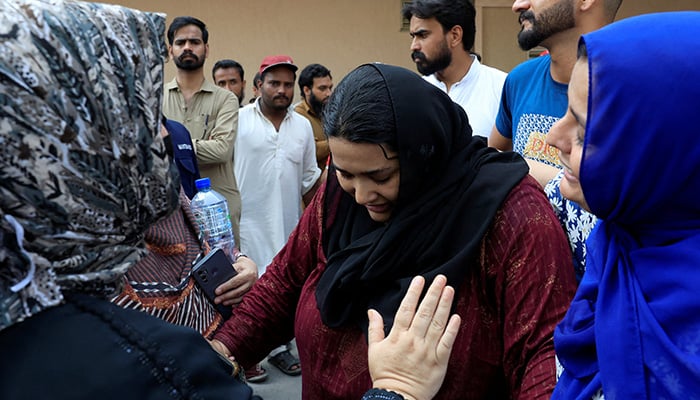 Javeria, mother of a newborn victim, is consoled following a deadly fire at the Pakistan Institute of Medical Sciences (Pims) hospital in Islamabad, August 26, 2026. — Reuters