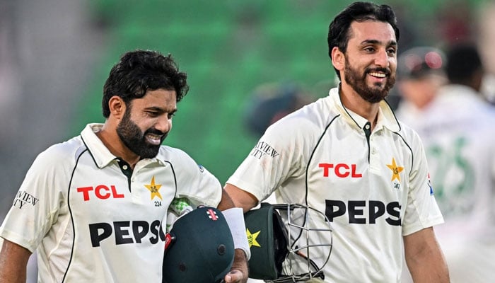 Pakistan’s Salman Ali Agha (right) and Mohammad Rizwan walk together during a Test match against South Africa on October 13, 2025. — Facebook/ PakistanCricketBoard