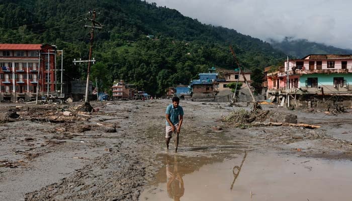 Rescuers search for survivors after devastating Nepal floods leave over 160 dead