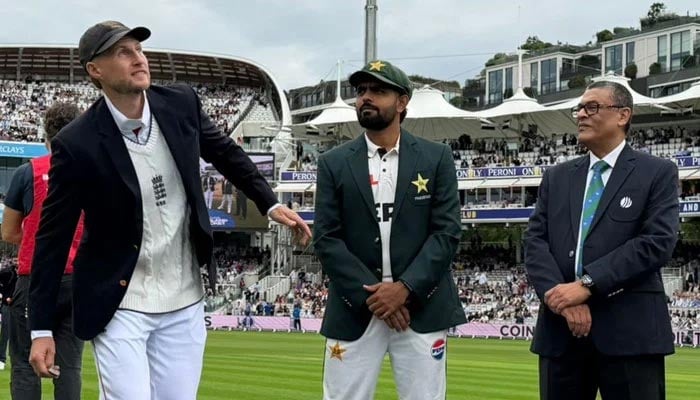 Englands Joe Root (left) and Pakistans captain Babar Azam look on during the toss ahead of the second Test match between England and Pakistan at Lords Cricket Ground, London, on August 27, 2026. — PCB